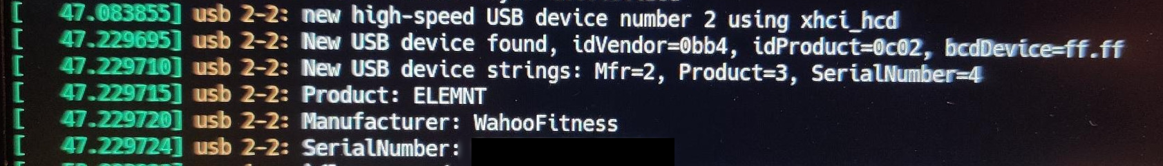 Crude screenshot of a laptop showing the Linux kernel happily reporting about a new USB Device by Wahoo Fitness 