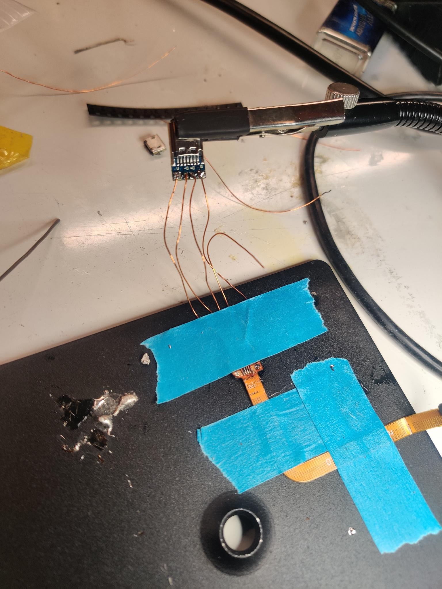 Soldering tiny wires onto flat flex cables